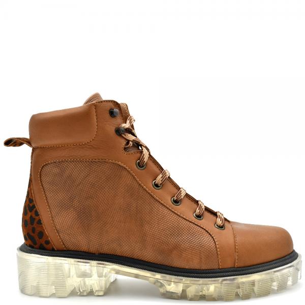 Women's boots in leather with a transparent sole